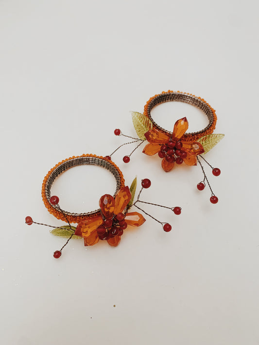 ORANGE FLORAL BEADED NAPKIN HOLDERS